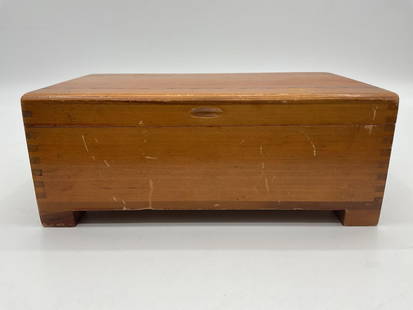 Mid Century Dovetail Wooden Storage Box: Description: Rectangular solid wood storage box with dovetail joints, inner divider, and hinged lid. Shows some exterior wear consistent with age.  Dimensions: H: 4in L: 9in W: 6in