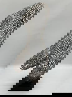 Abstract Female Torso Sculpture: Contemporary openwork sculpture of a female torso, crafted from interlinked metal rings forming a hollow yet expressive silhouette. The piece stands on a black rectangular base, blending industrial de