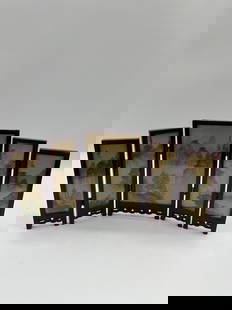Chinese Folding Table Screen with Landscape Panels: Decorative five-panel tabletop screen featuring traditional Chinese landscape paintings of mountains, trees, and mist. Each panel is mounted in a dark wooden frame with carved lattice-style bases and