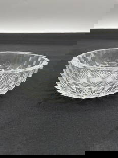 Small Pressed Glass Starburst Bowl: Description: Clear pressed glass bowl featuring a starburst pattern on the base with faceted sides. Likely used for serving sauces, condiments, or small desserts. Dimensions: H:2in Dia:5in