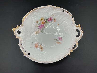 Antique German Reticulated Porcelain Bowl with Floral Decoration - CT: This ornate porcelain bowl features a scalloped and reticulated rim with pierced handles and gilt accents. The interior is decorated with delicate hand-applied floral transfers in pink, orange, and wh