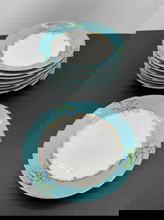 Set of 8 Vintage Porcelain Plates with Blue Floral Border: This is a matching set of 8 vintage porcelain plates featuring a soft turquoise-blue border with hand-painted floral accents and a gold rim. The flowers appear to be blue forget-me-nots or similar, an