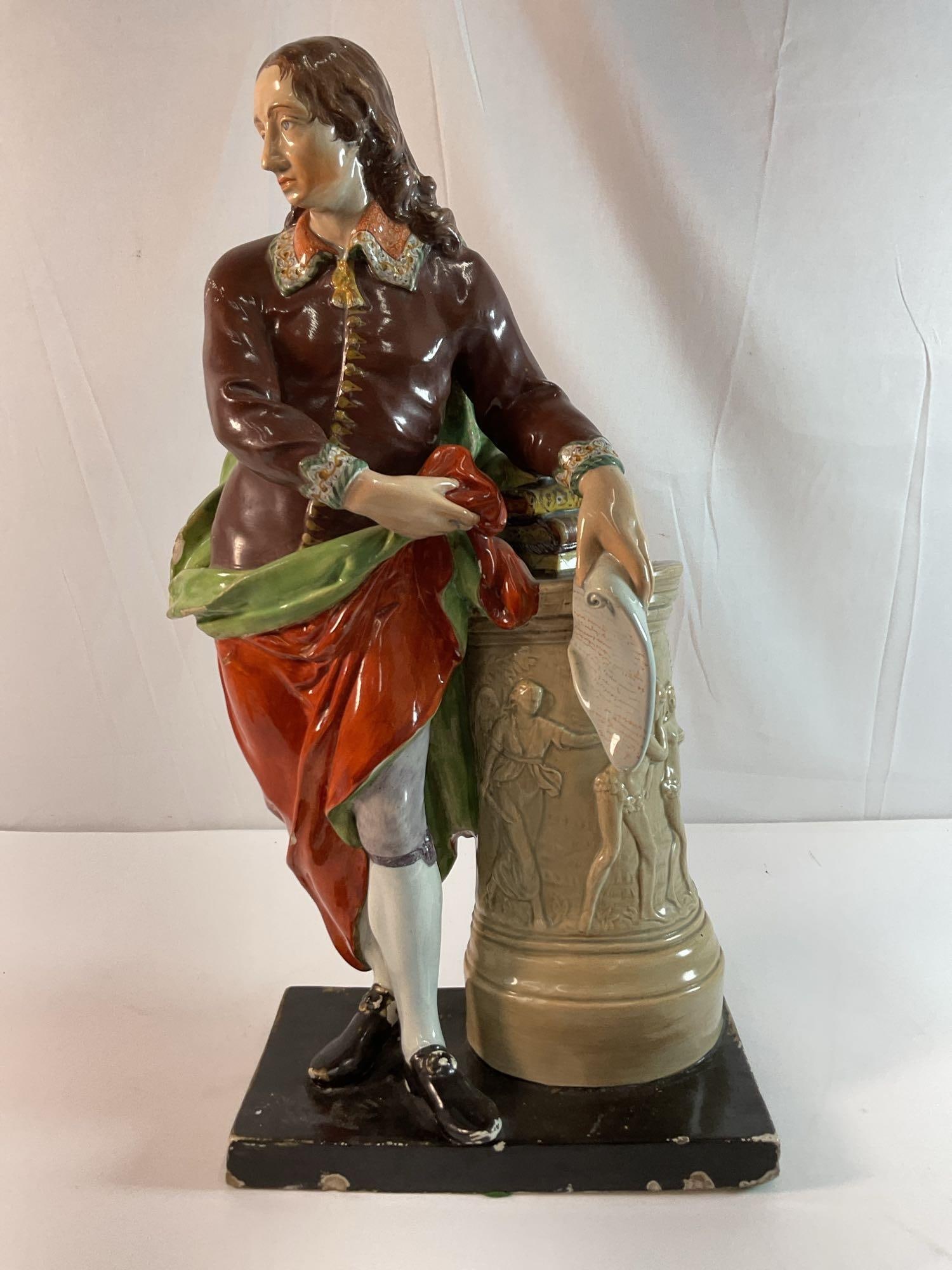 Staffordshire Pearlware Figure of John Milton: 19th century English pottery from Staffordshire, of famous English poet and intellectual John Milton. Dimensions: H:19in L:10in W:5in approx Materials: Porcelain