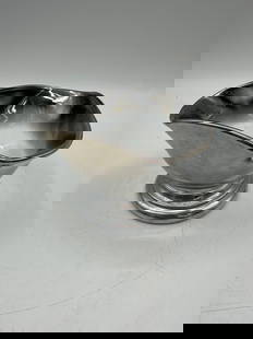 Silver-Plated Footed Serving Bowl: Description: Elegant silver-plated bowl with scalloped rim and pedestal base, suitable for serving or display. Dimensions: H:3.5in L:5in W:5in
