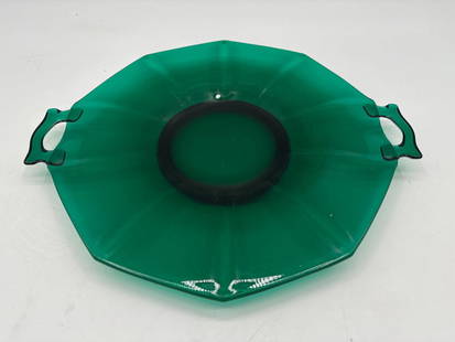 Vintage Green Depression Glass Serving Bowl: Description: Octagonal pressed green glass bowl with side handles and fluted interior design, typical of Depression-era glassware. Dimensions: H:1in L:12in W:11in