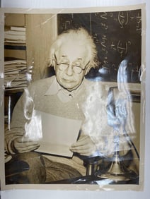 Albert Einstein with Paper and Blackboard (Photo by Edward H. Querin)