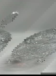 Vintage Footed Cut  Czech Crystal Candy or Trinket Dish: This elegant cut crystal dish rests on three feet and features intricate geometric and floral patterns throughout its rounded form. The bowl sparkles with prismatic detail, capturing and reflecting li