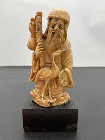 Carved Figurine of Shou Xing with Crane