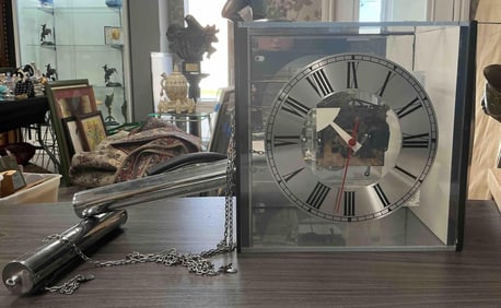 Howard Miller Glass and Chrome Skeleton Clock