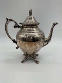 Vintage Silver-Plated Teapot with Ornate Handle and Finial