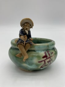 Oriental Ceramic Ashtray with Seated Fisherman Figure