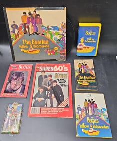 Beatles Yellow Submarine Collectibles Lot with DVD, Record, VHS, and More
