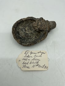 23 - Spoon Shaped like a hand and lion head black stone 10th Century B.C.