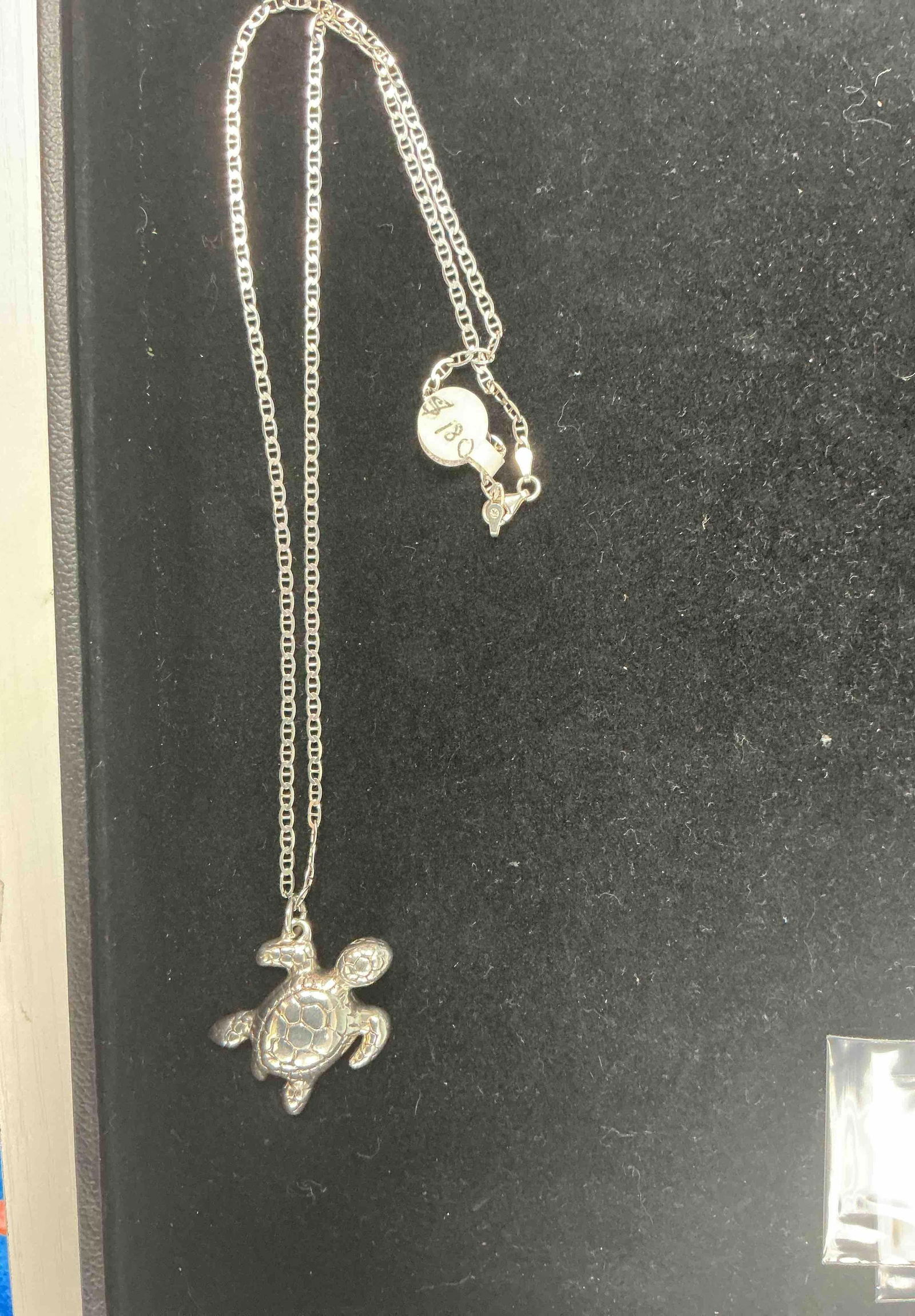 Sterling Silver 925 Chain with Turtle Pendant, 22" – 8.77g: Charming sterling silver necklace featuring a detailed turtle pendant with textured shell patterning, suspended from a 22-inch sterling silver chain, both stamped 925. The whimsical yet elegant design