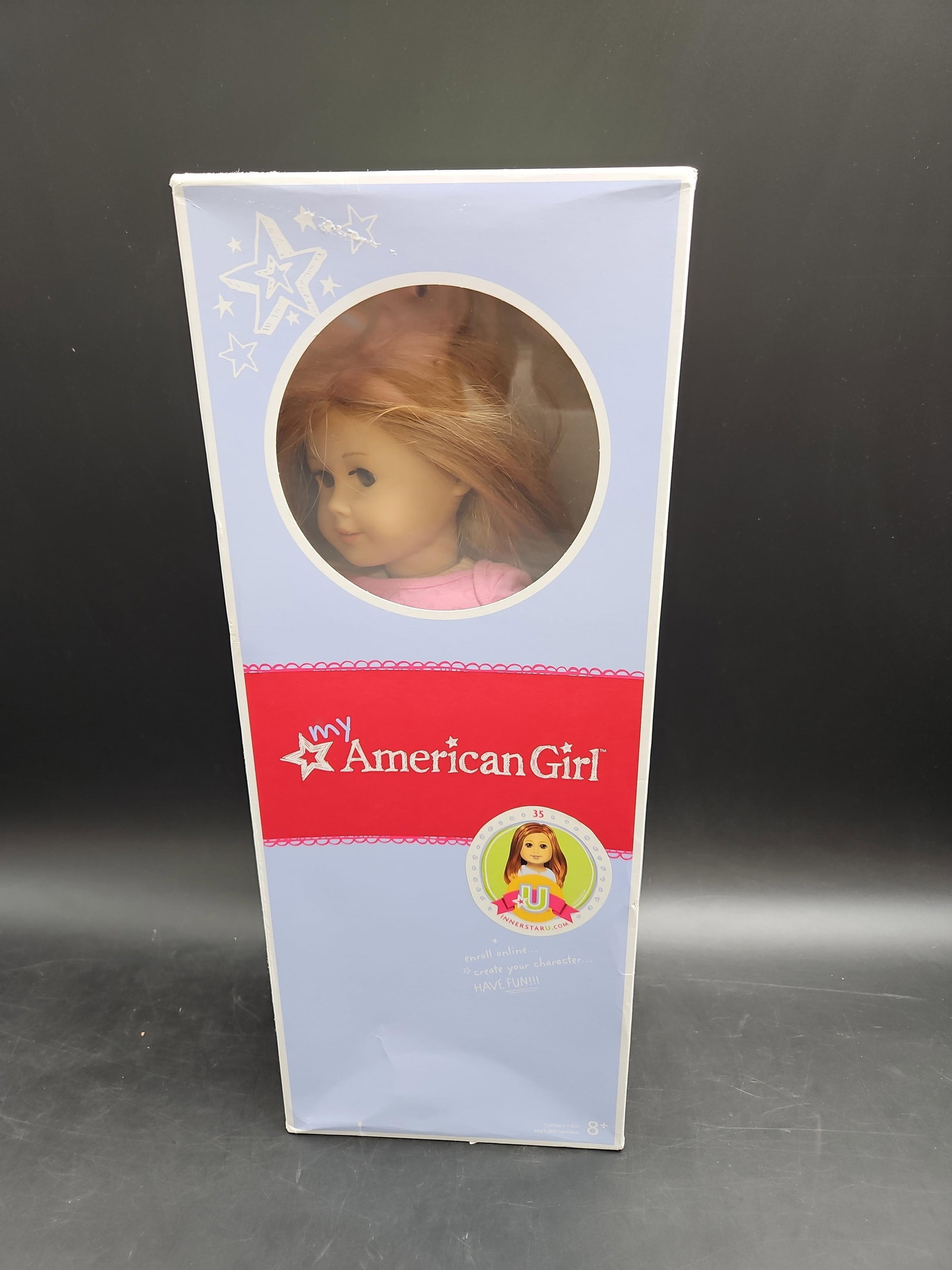 My American Girl Doll: This is a My American Girl Doll from the American Girl doll line. These dolls are part of a customizable collection where children can choose features such as hair color, eye color, skin tone, and acc