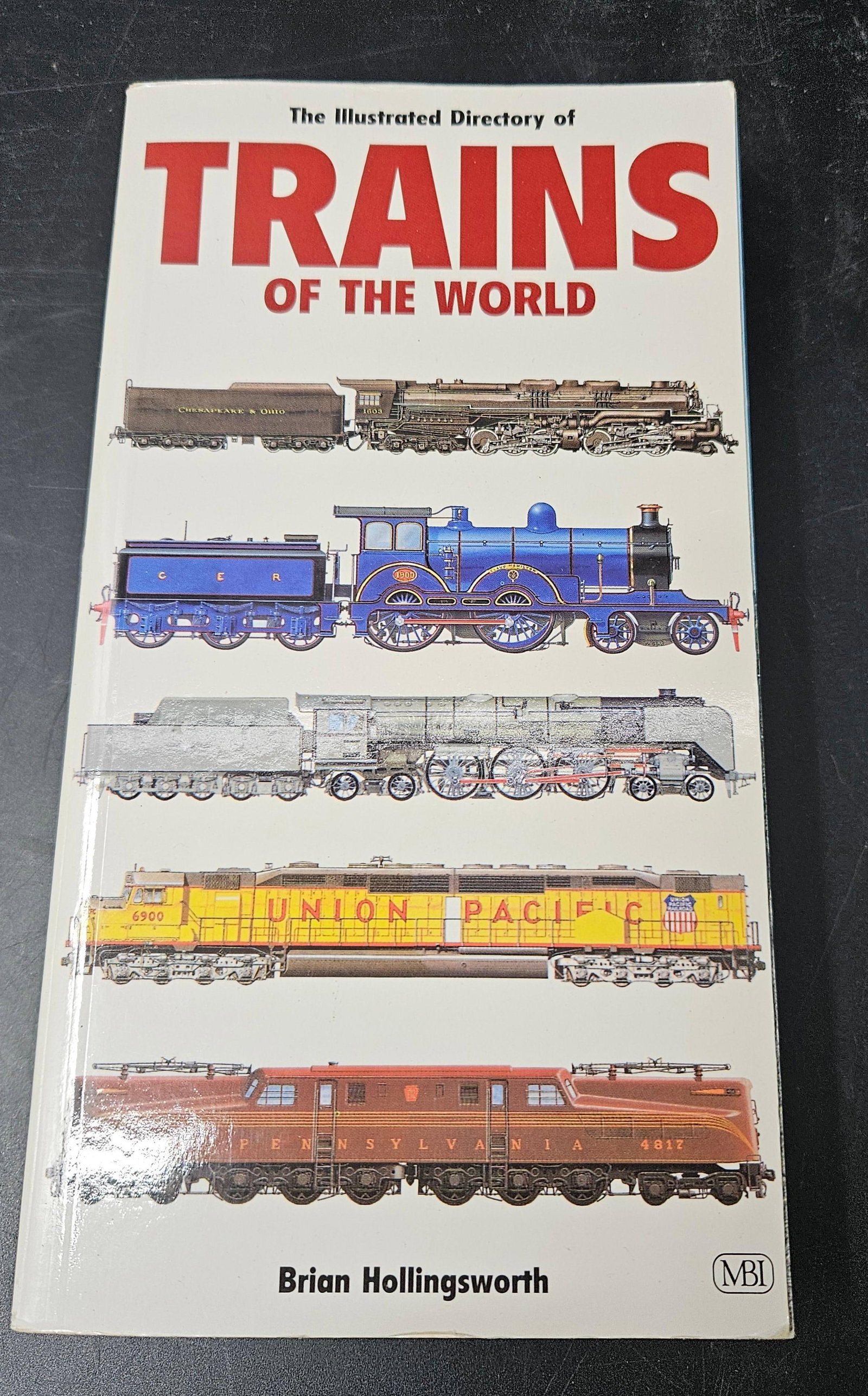 Trains of the World by Ken Hollingsworth: Illustrated reference book showcasing the world's major steam, electric, and diesel locomotives from 1825 to the present. Includes over 600 entries with detailed illustrations. Medium: Softcover b