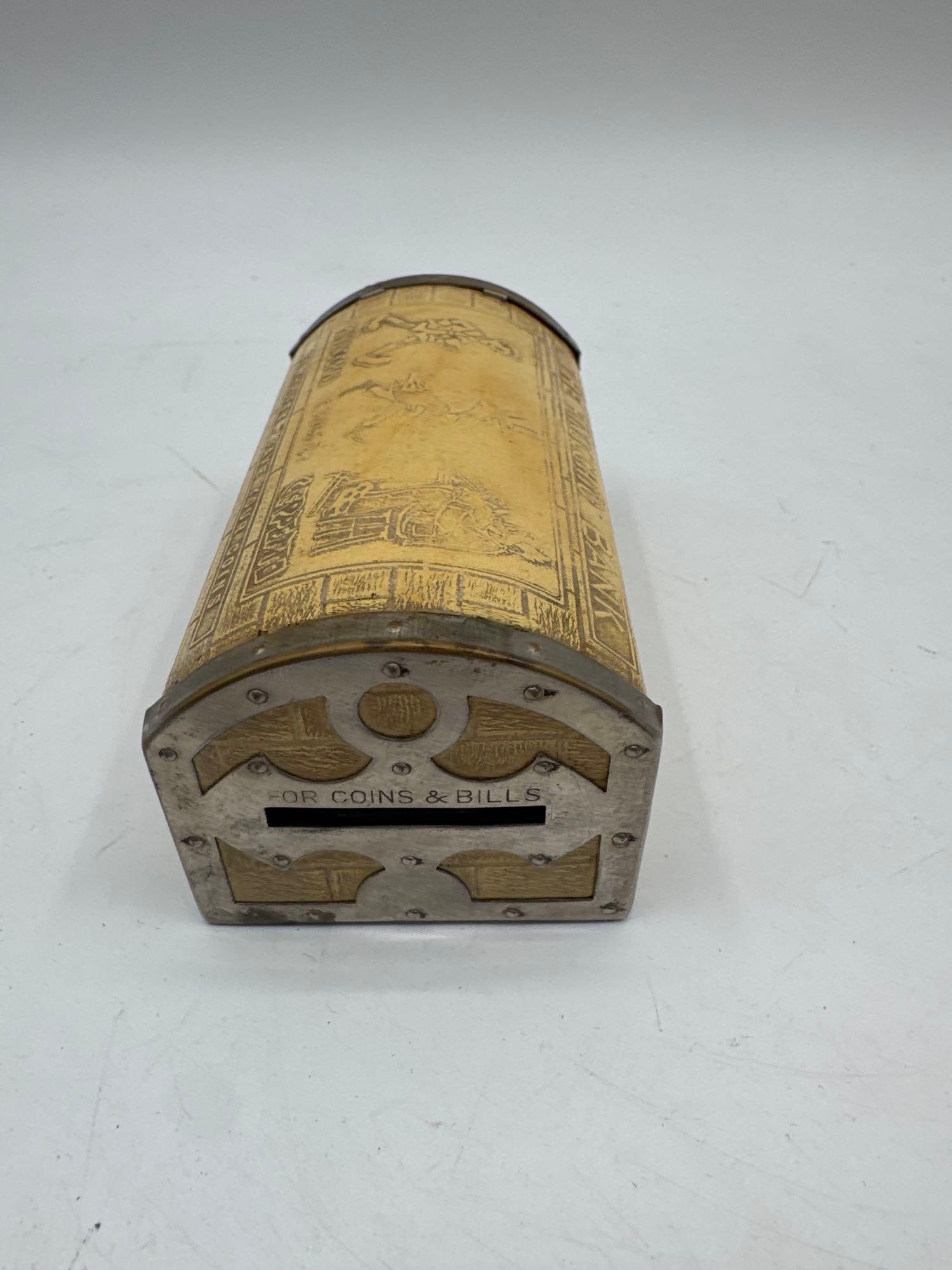 RARE Vintage The Pinocchio Bank - Pat Appd for US & Foreign: Vintage cylindrical coin bank decorated with Pinocchio themed etched illustrations. Features a mechanical deposit slot labeled "For Coins & Bills" at one end, likely part of a novelty or p