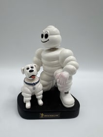 Michelin Man and dog figurine