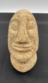 Carved Stone Face Sculpture