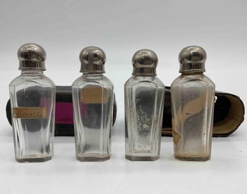 Set of Four Antique Glass Apothecary Bottles with Silverplate Caps