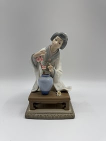 Lladro Figurine: Arranging Flowers