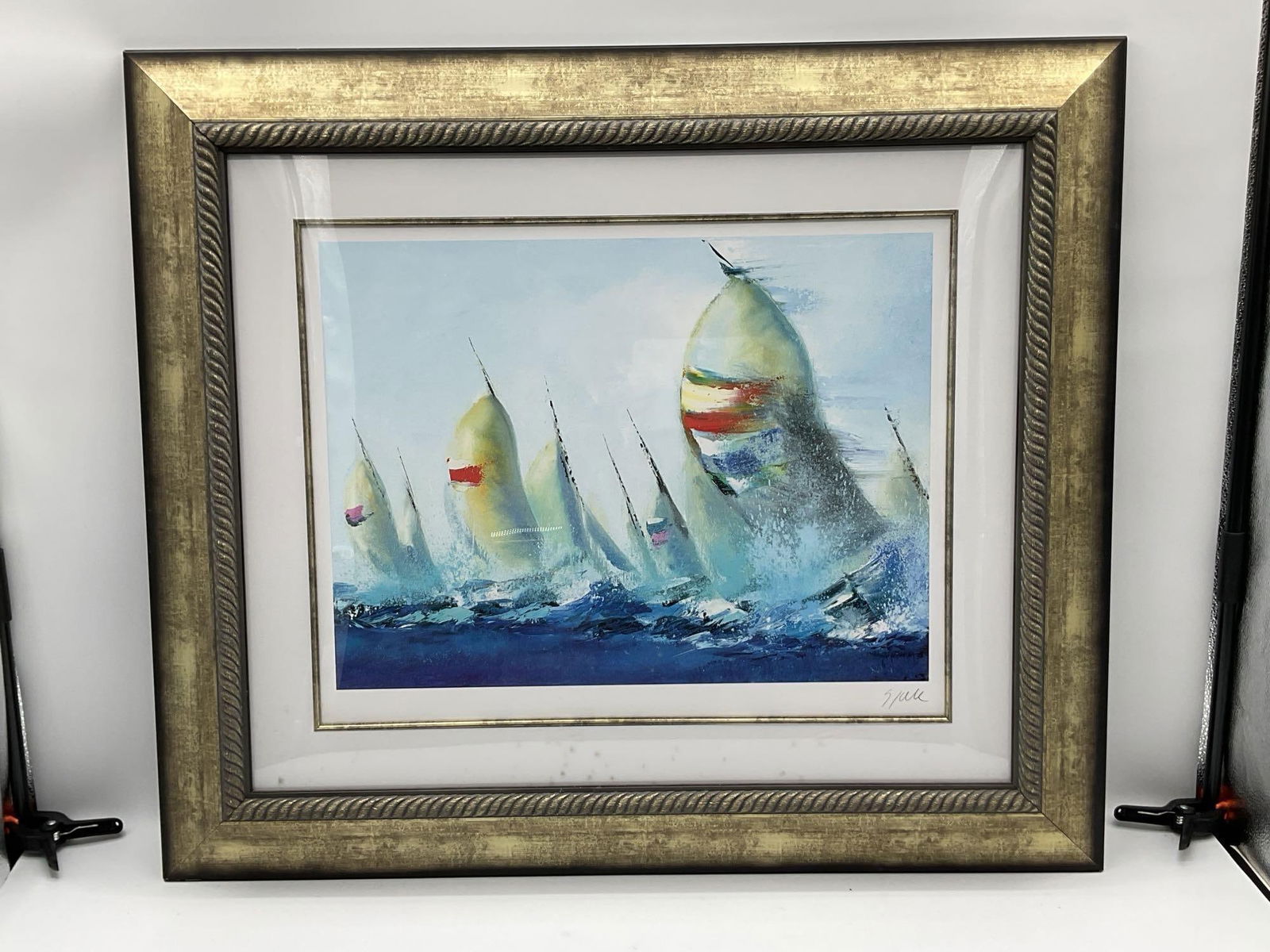 July Sails by Victor Spahn (France, b.1949) Seriolithograph: Dynamic composition of sailboats racing across the water, rendered with expressive brushwork and bold color. Signed by the artist in pencil bottom right. Dimensions: H:31in L:36in Medium: Seriolithogr