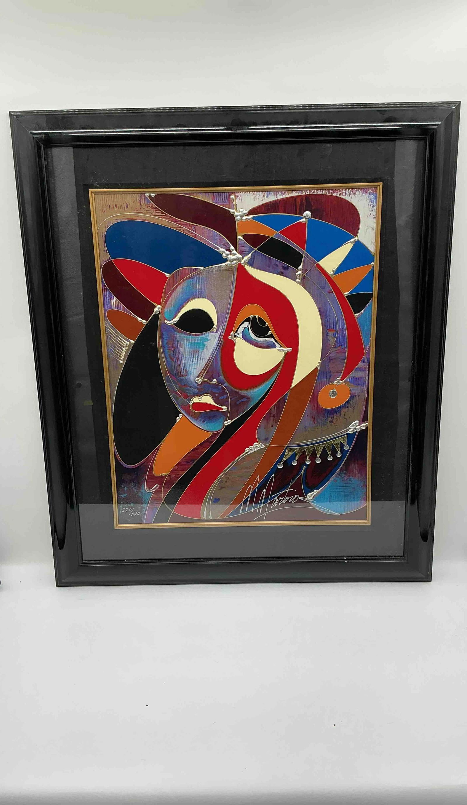 "Introspection" by Martiros Manoukian (Armenia, b.1947) Mixed Media: Description: A striking and emotive portrait by Martiros, titled Introspection, showcasing a stylized female face in a fusion of rich jewel tones and abstract forms. The expressive features