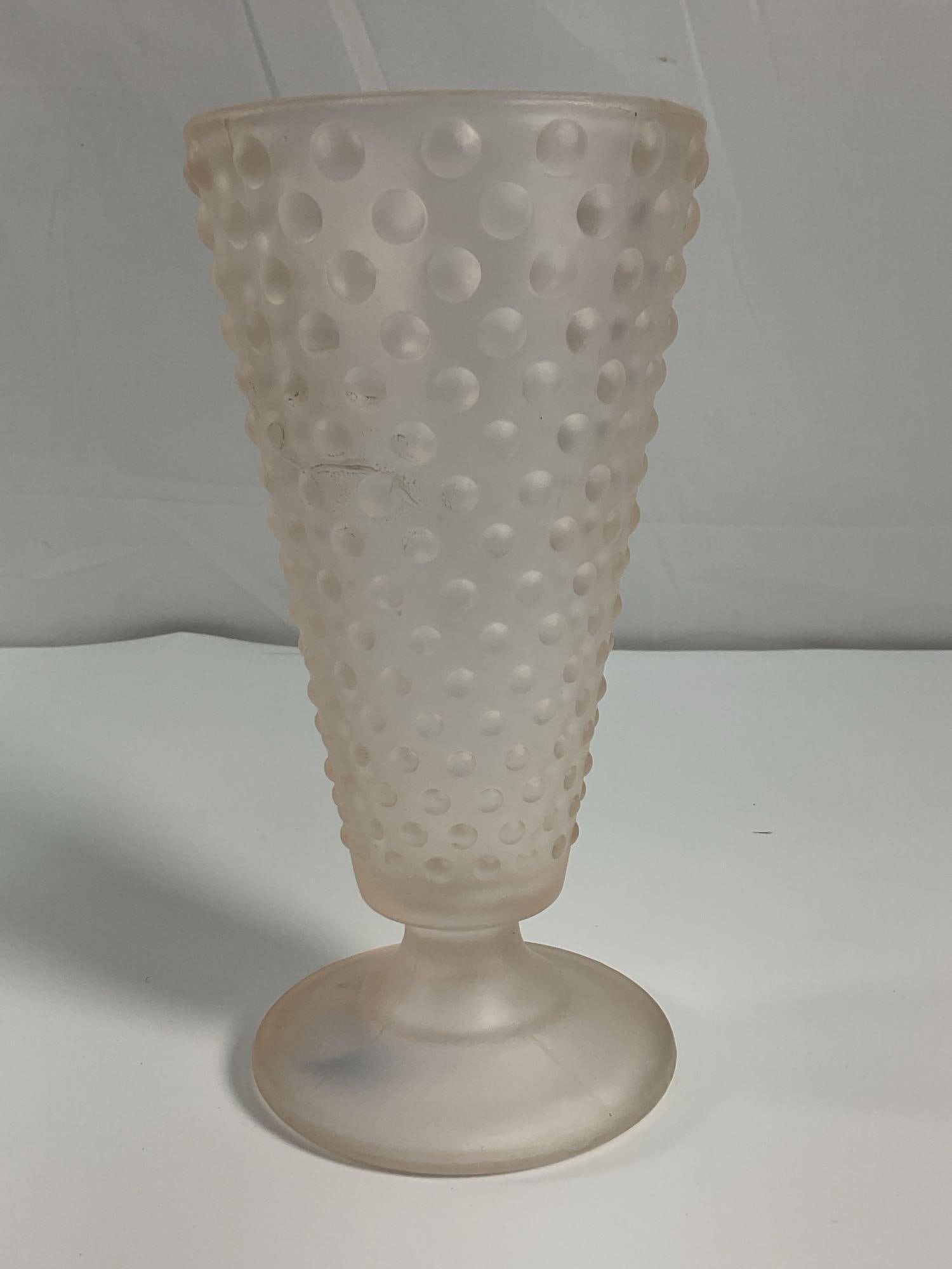 Glass Vase - Box 16:  A vintage frosted glass vase featuring a hobnail pattern, giving it a raised bubble-like texture. The tapered shape and pedestal base suggest it was designed as a bud vase or decorative accent. 