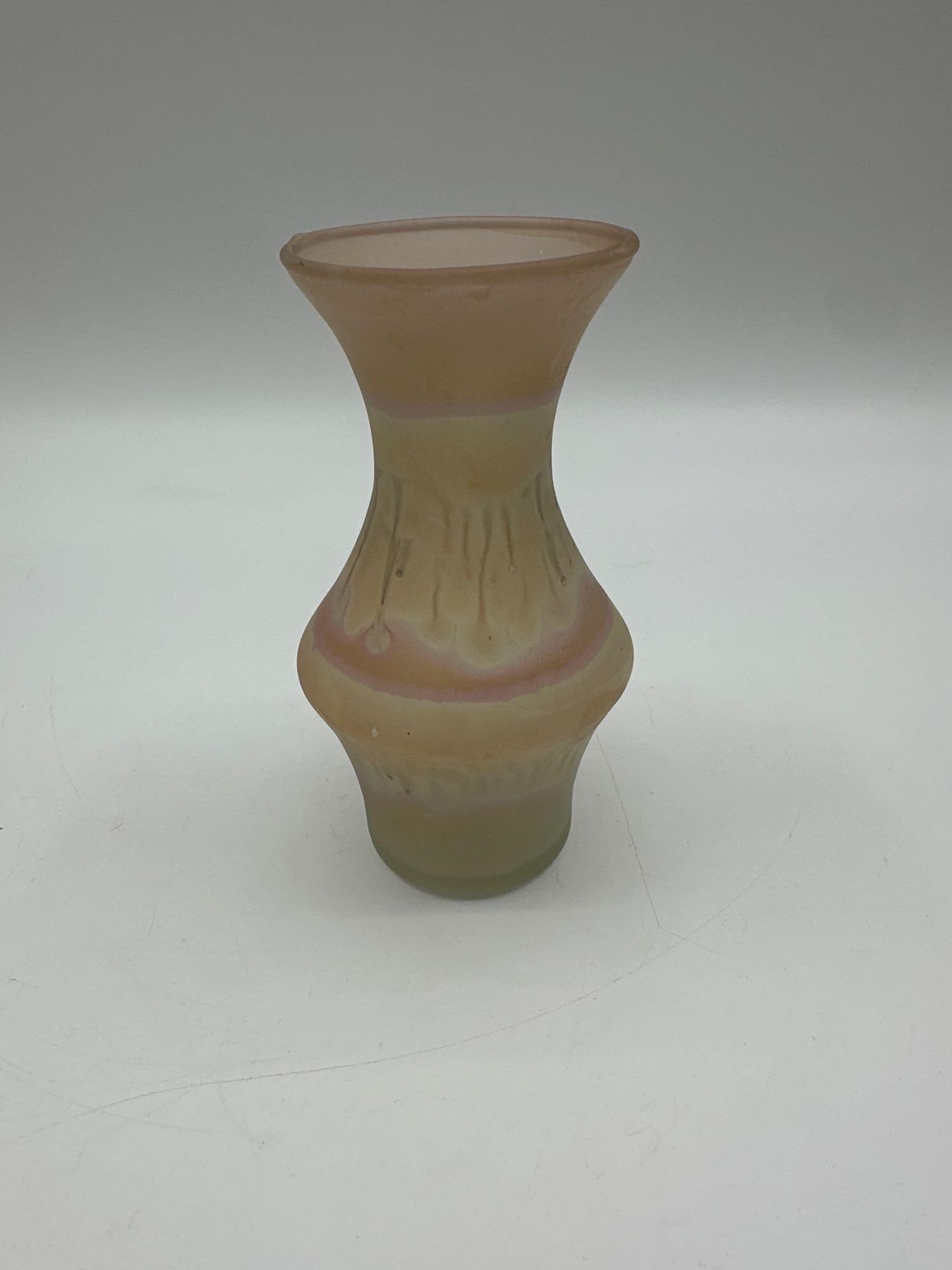 Small Art Glass Vase with Iridescent Finish: Handcrafted art glass vase with bulbous body and flared rim in warm iridescent tones of pink, yellow, and olive Medium: Art glass Dimensions: H5.5in x L3.5in x W3.5in 
