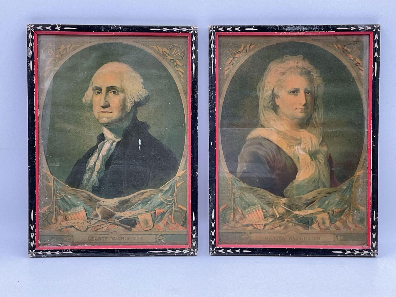 George and Martha Washington portraits: These are chromolithograph prints of George and Martha Washington, dating to around 1880. The portraits are likely based on the original "Athenaeum" portraits by the artist Gilbert Stuart. T