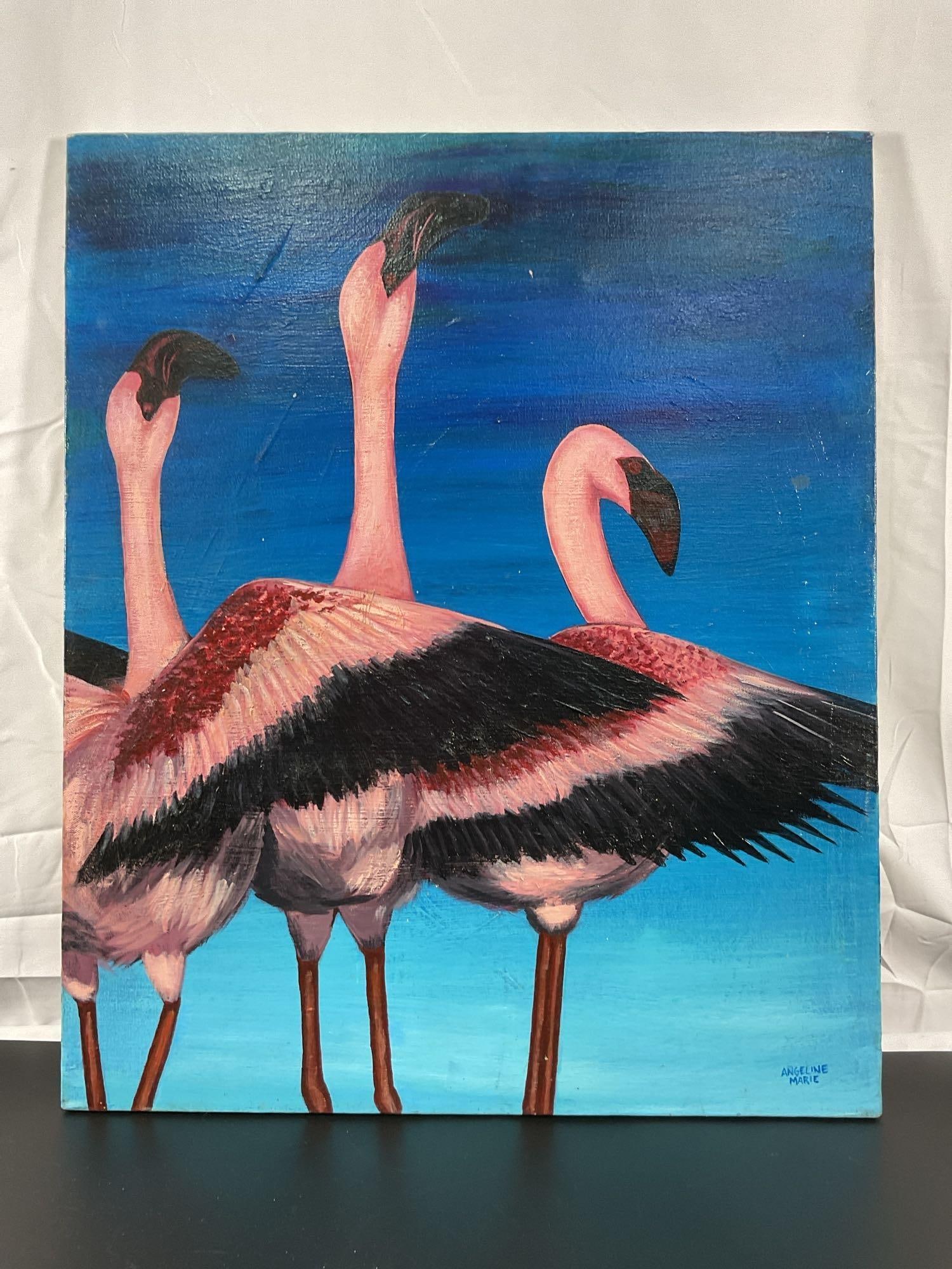 "Flamingo Trio" by Angeline Marie: This vibrant painting features a trio of flamingos with beautifully detailed feathers and a striking contrast between the pink and black plumage. The deep blue background enhances the boldness of the