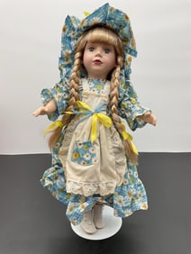 Porcelain Doll in Blue Daisy Dress with Bonnet