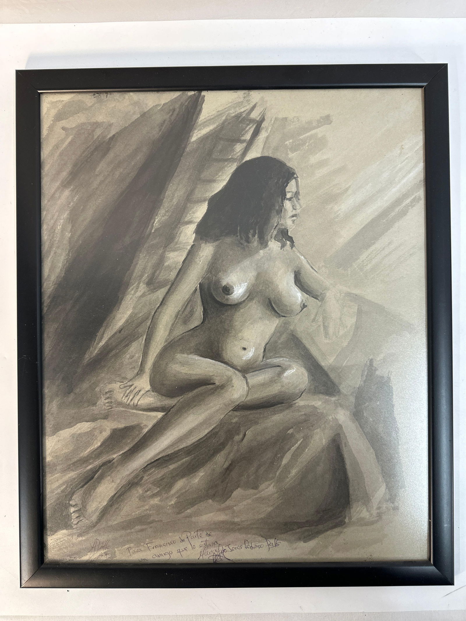 Manuel de Jesus (Cuban) Charcoal Drawing: This artwork by Cuban artist Manuel de Jesus showcases a grayscale or monochromatic depiction of a reclining nude figure amidst a soft, draped background. The piece emphasizes the play of light and sh