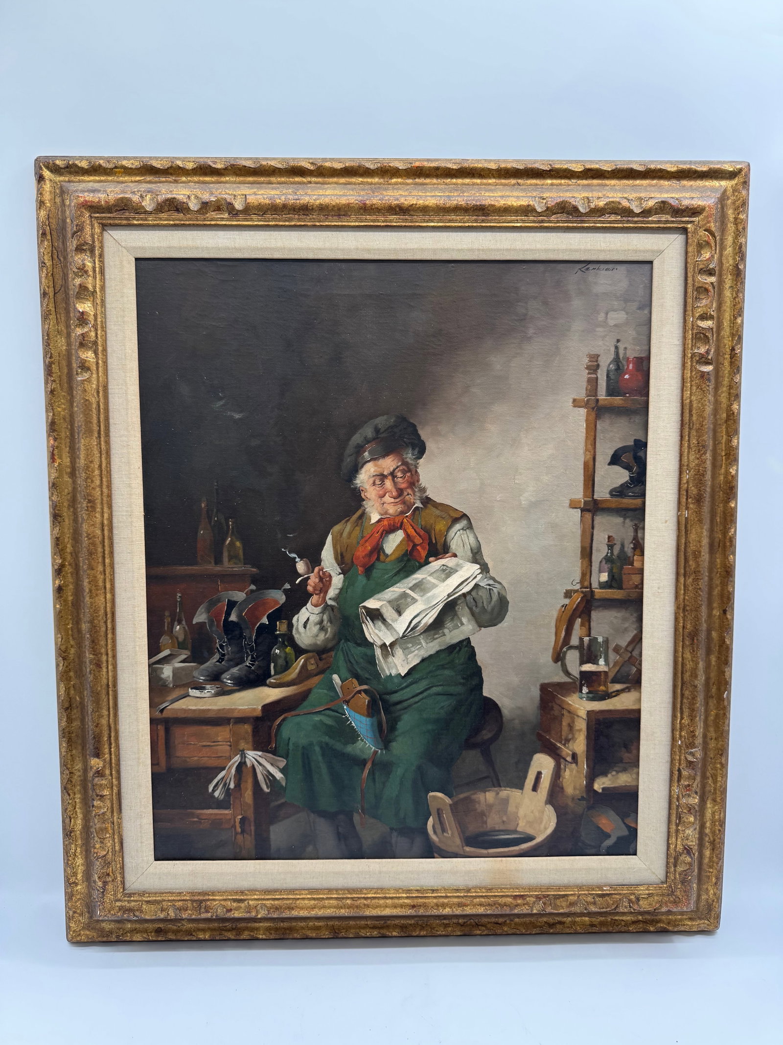 Signed Hans Kerber Oil Painting of a Cobbler: Oil on canvas painting depicting a cobbler at work, signed 'Kerber' upper right. The painting is housed in a decorative gilt frame. 