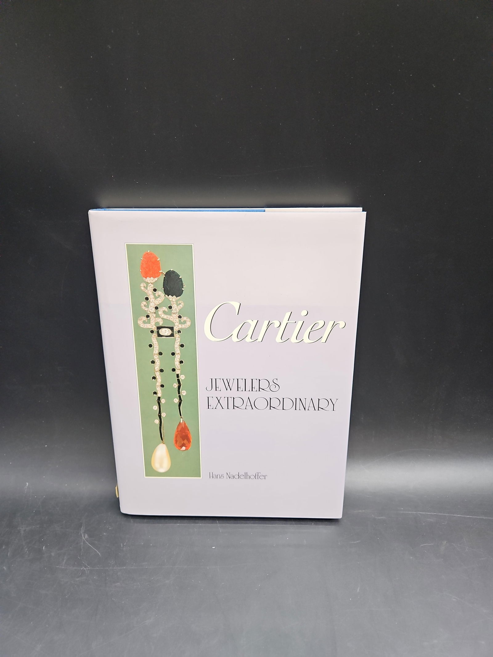 Cartier: Jewelers Extraordinary: An illustrated hardcover volume on Cartier, the world-renowned French jeweler. This book explores the history, craftsmanship, and iconic creations of Cartier, featuring high-quality photographs of jew