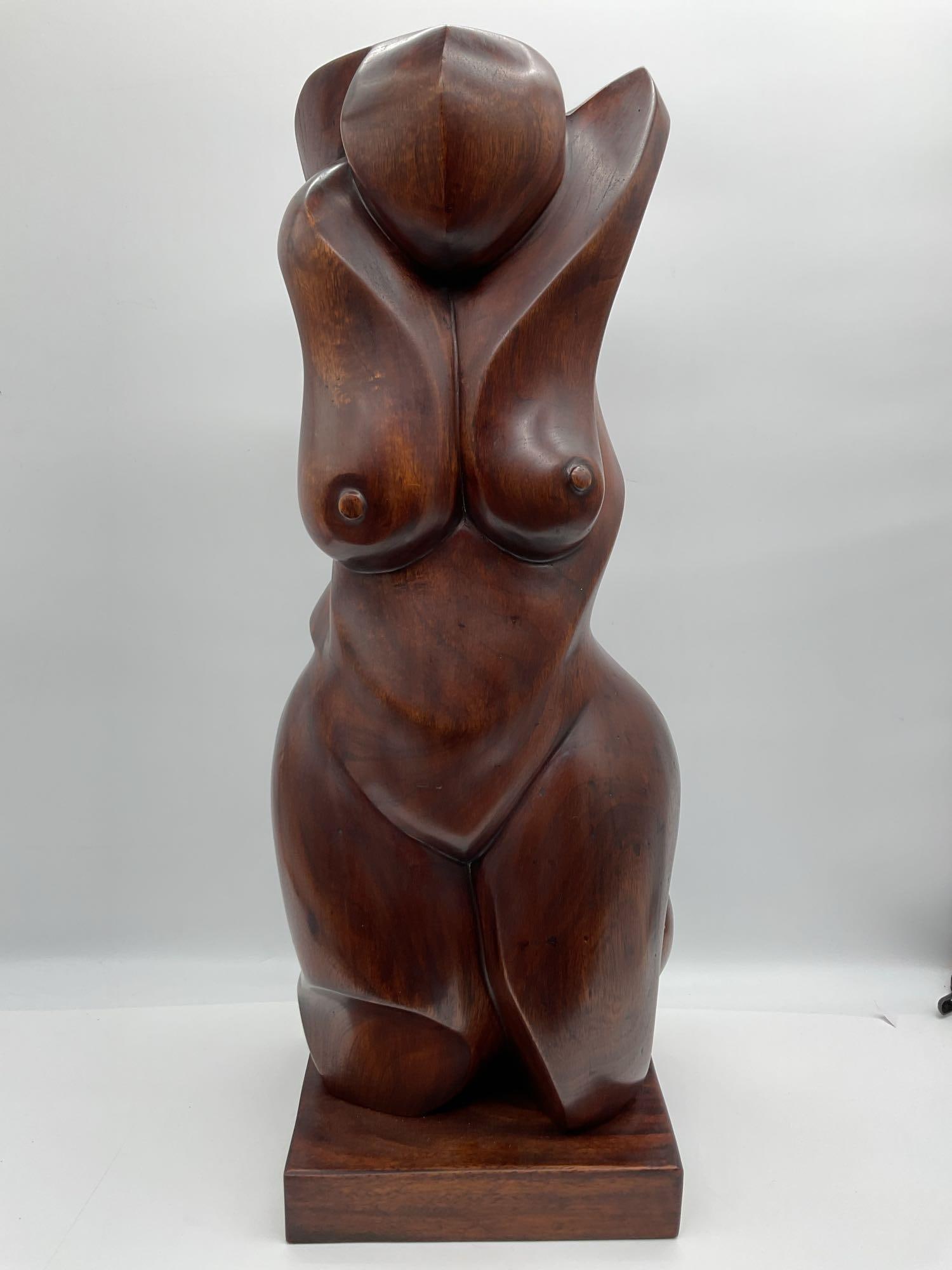 Abstract Carved Wood Nude Female Torso Sculpture: Stylized hand-carved wooden sculpture depicting a nude female torso in an abstract modernist form. Richly grained hardwood with a smooth finish, mounted on a square base. Likely mid to late 20th centu