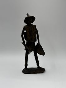 Metal Folk Art Figure of a Man with Pan