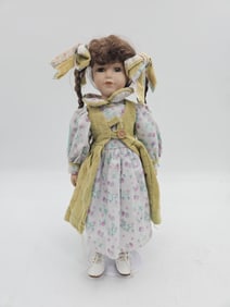 Porcelain Doll with Braids and Floral Dress