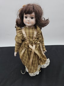 Porcelain Doll with Brown Hair and Plaid Dress
