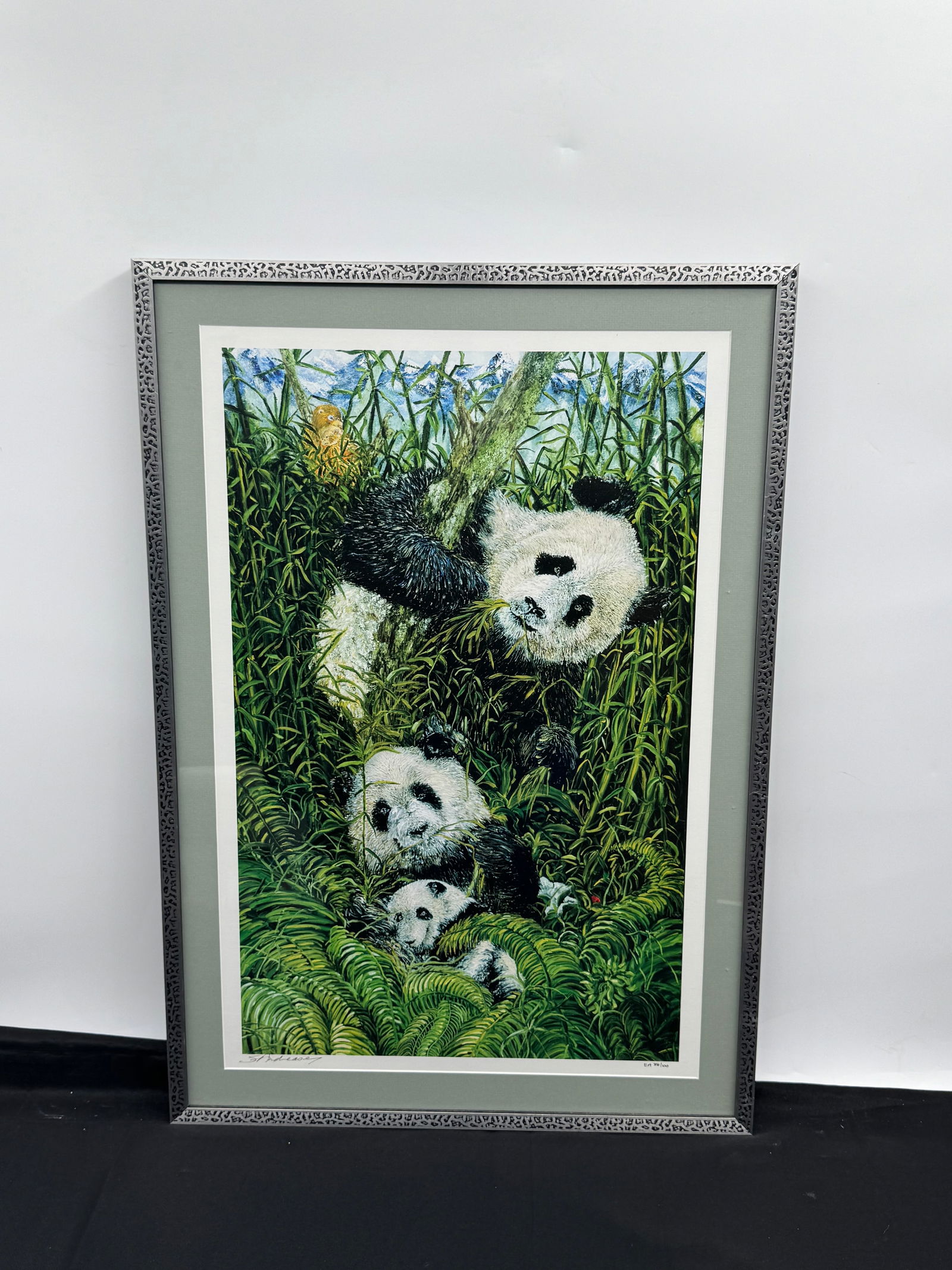 "Endangered Pandas" by Susan Andreason (American, b.1948) Print: Description: Framed print featuring a charming depiction of pandas amidst lush greenery. Signed Susan Andreasen and numbered 38/100. The print is presented in a decorative frame, ready for display. Me