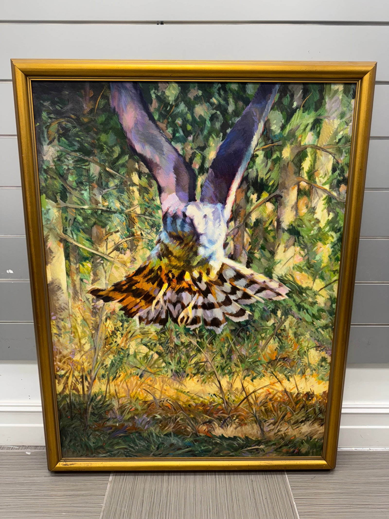 "Raptor" by George Harkins (American, b.1935) Oil on Canvas: Description: Oil on canvas painting depicting a hawk in flight over a wooded landscape. Signed lower right. Presented in a gilt frame. Medium: Oil on canvas Dimensions: 40 x 52.5 inche