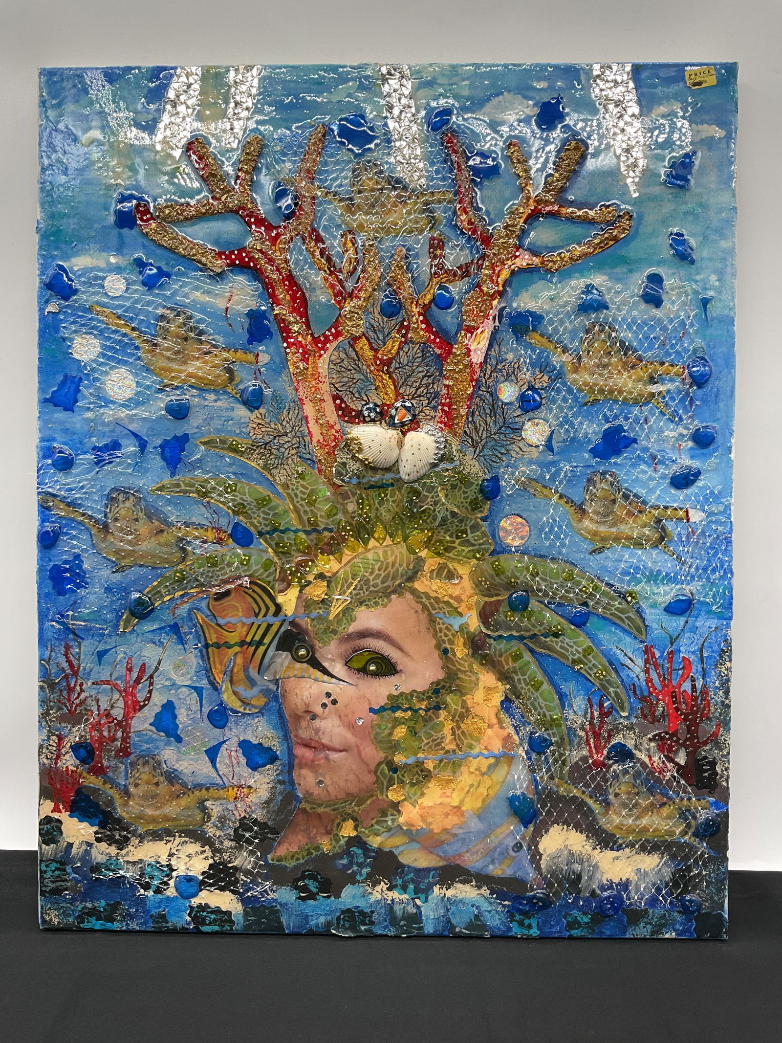 "Save the Turtles" by Ivonne Krantz (Panama, 1954) Mixed Media Eco Friendly Art: Description: Mixed media collage titled "Save the Turtles" by Yvonne Krantz. Features acrylic paint on canvas with hand-cut paper and glass. . Eco-friendly art depicting a mermaid looking ou