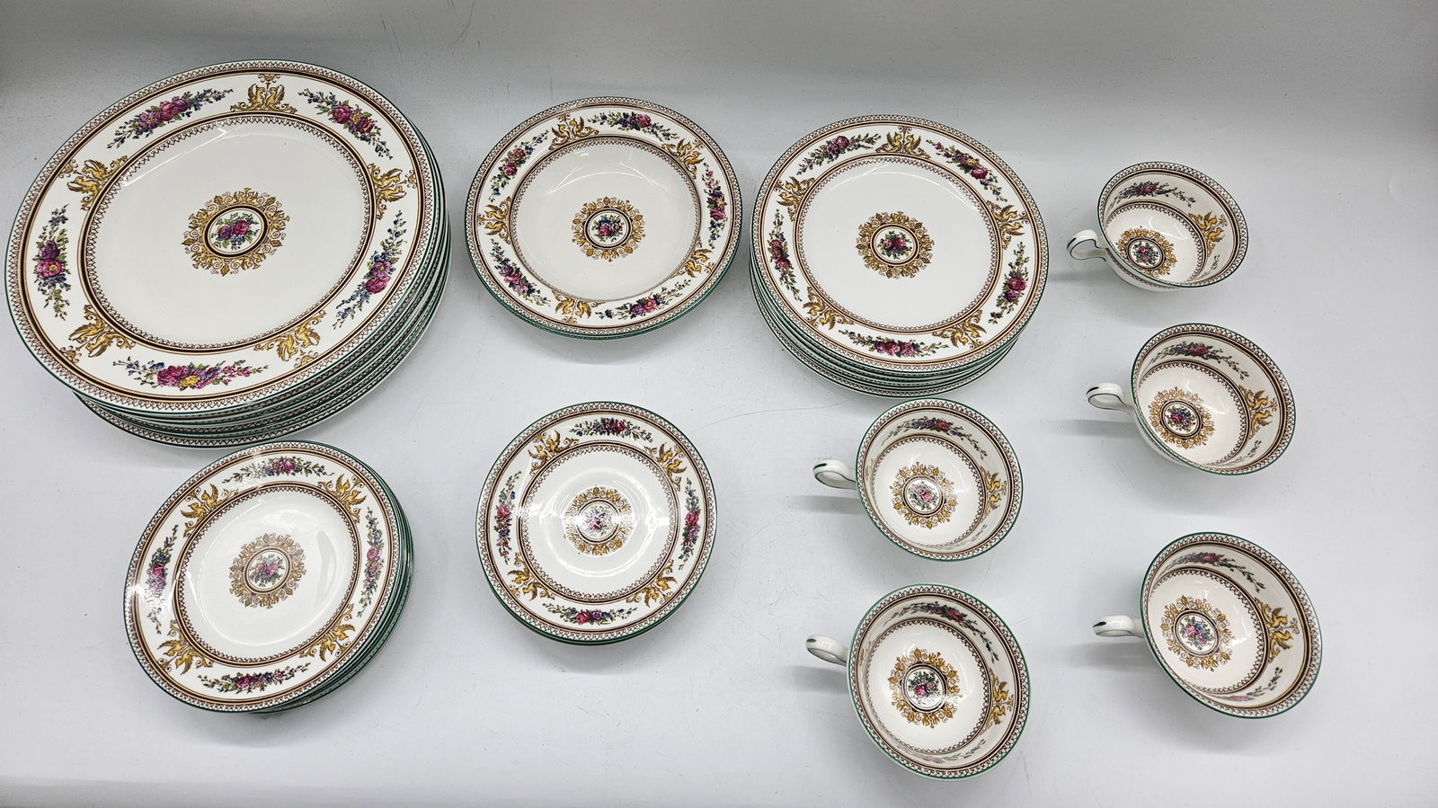 RARE Vintage Wedgwood Columbia W595 Bone China 36-Piece Set: Luxurious hand painted 36-piece Wedgwood bone china dinnerware set from the Columbia W595 pattern. Features intricate floral and gold detailing with classical motifs, handcrafted in England&mdash