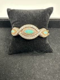 14 Kt Gold Bangle Bracelet with Diamonds and Opal Accents