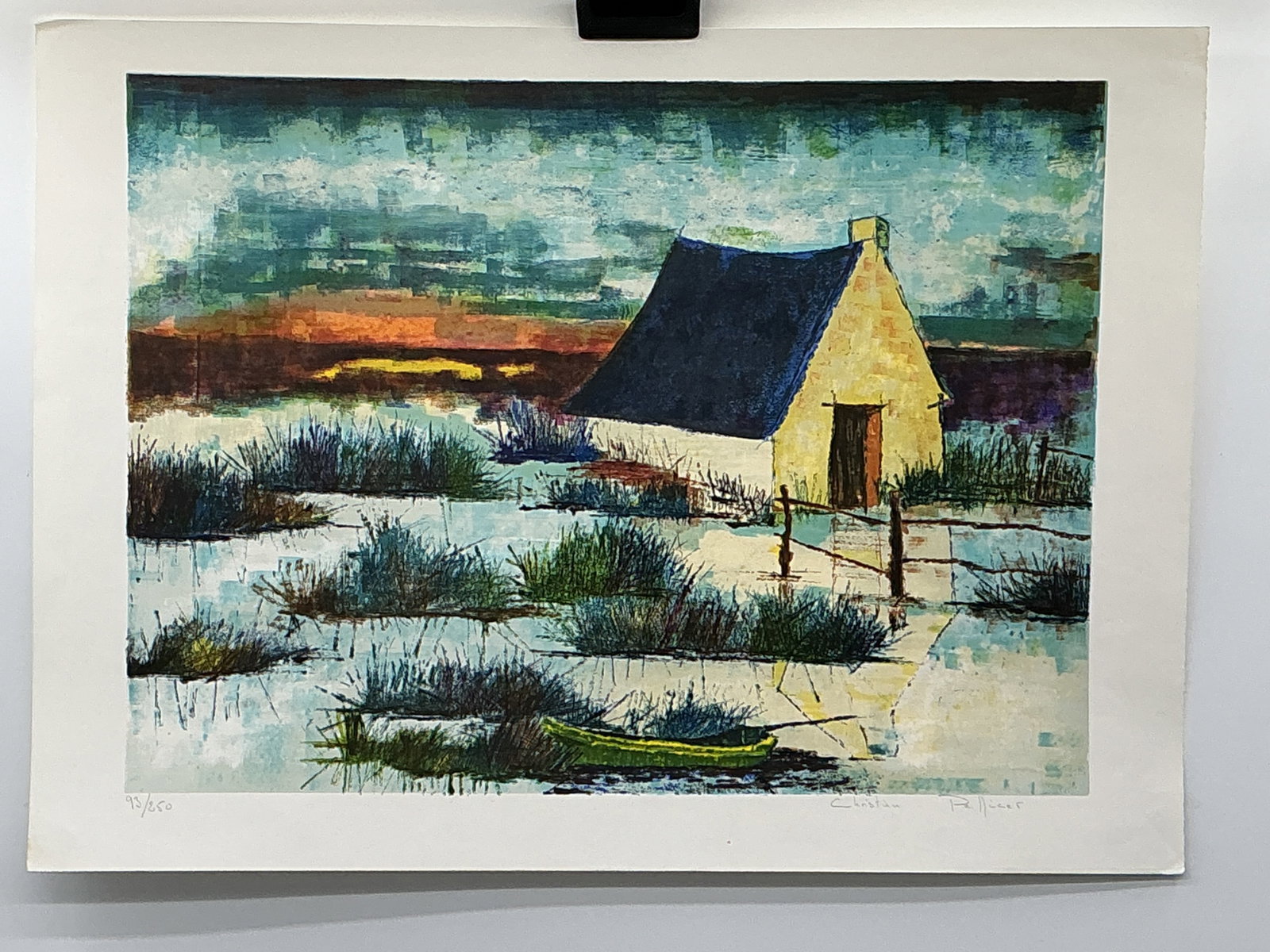 Christian Pellicer Limited Edition Print, 93/850: Christian Pellicer, limited edition print, numbered 93/250. The artwork depicts a marsh landscape with a small building and boat. Signed by the artist in the lower right corner. The print features a v