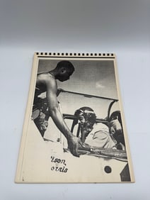 Vintage Scrapbook with Photographs and Clippings