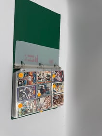 Football trading card collection in binder