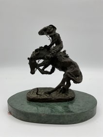 Cowboy on Bucking Horse by Remington