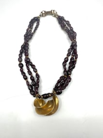 Multi-Strand Garnet-Colored Beaded Necklace with Brass Abstract Pendant