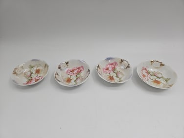 Set of Four Hand-Painted Floral Porcelain Bowls